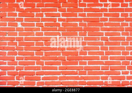 Red brick wall and stone floor background. Stock Photo