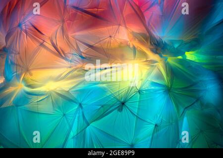 Backdrop of Flowing colorful fabric with light and shadows Stock Photo