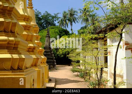 Cambodia Krong Siem Reap - Wat Bo garden view with golden stupas Stock Photo
