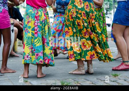 Salvador, Bahia, Brazil - November 21, 2015: People dancing samba with typical samba de roda clothes from Bahia. Stock Photo