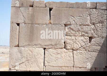 Texture of a stone wall. Old castle stone wall texture background. Stone wall as a background or texture. Part of a stone wall, for background or text Stock Photo