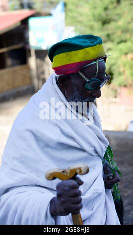 An elderly Ethiopian man wearing a rasta color hat. Stock Photo