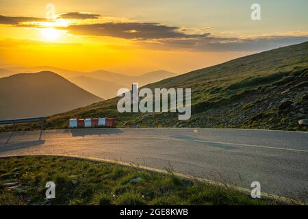 Sunrise over the famous national road 67C in Romania called Transalpina Stock Photo