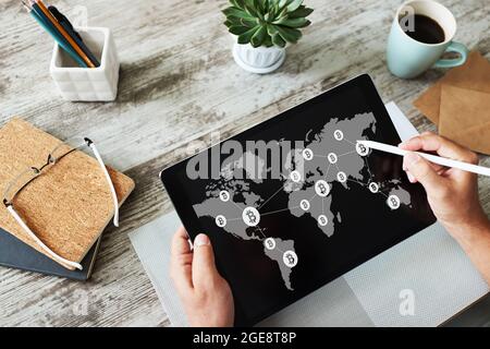 Bitcoin world map and blockchain technology concept on screen Stock Photo