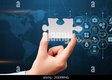 Hand Holding Jigsaw Puzzle Piece Unlocking New Futuristic Technologies. Palm Carrying Puzzles Part Displaying Solving Late Innovative Virtual Ideas. Stock Photo