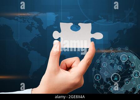 Hand Holding Jigsaw Puzzle Piece Unlocking New Futuristic Technologies. Palm Carrying Puzzles Part Displaying Solving Late Innovative Virtual Ideas. Stock Photo