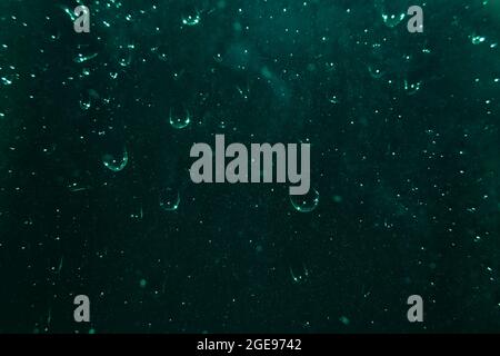 drops of water on dark glass. Abstract background Stock Photo