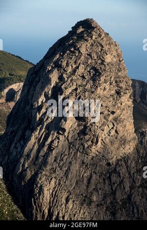 Roque de Argando is a well known phonolite volcanic plug at the center of La Gomera in the Canary Islands. Stock Photo