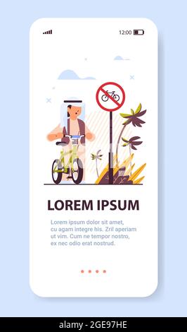 arab schoolboy with bicycle standing near red round bike ban sign road safety concept vertical copy space full length vector illustration Stock Vector