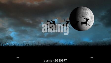 Composition of santa claus in sleigh with reindeer over clouds and moon Stock Photo