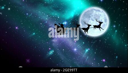 Composition of santa claus in sleigh with reindeer over stars and moon Stock Photo