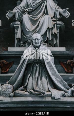 Vertical shot of the Monument to Pope Pius VIII inside St. Peter's Basilica in Vatican City Stock Photo