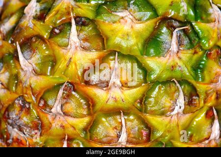 Texture of pineapple skin. A pineapple bark. Abstract Background of Nature. Stock Photo