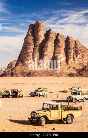 The rock formation known as 'The Seven Pillars of Wisdom' in the Jordanian desert at Wadi Rum or Valley of the Moon. Stock Photo