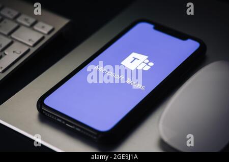 iPhone with Microsoft Teams video call app logo on the screen. Stock Photo