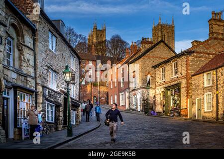 Looking up Steep Hill in Lincoln towards the Cathedral. Stock Photo