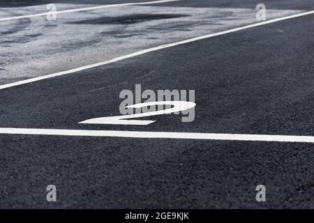 The number two painted on asphalt Stock Photo