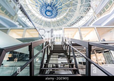 View from below of staircase in modern office center Stock Photo