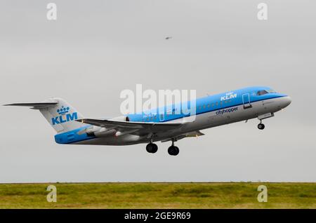 KLM Cityhopper Fokker 70 jet airliner plane PH-KZW taking off from Manston Airport, Kent, UK. Regional airline of KLM. Feeder airline Stock Photo