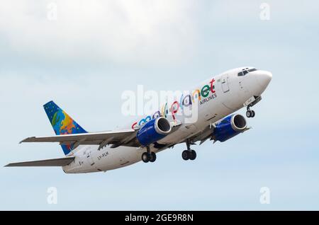 Small Planet Airlines Boeing 737 jet airliner plane LY-FLH taking off from Manston Airport, Kent, UK. Climbing departure Stock Photo