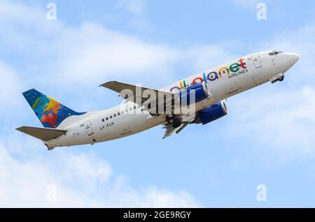 Small Planet Airlines Boeing 737 jet airliner plane LY-FLH taking off from Manston Airport, Kent, UK. Climbing departure Stock Photo