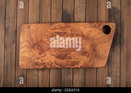 Wooden board mock up on a dark wooden background Stock Photo