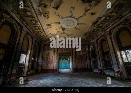A once opulent Soviet era train station sits in ruins in the capital city of Sukhum. Stock Photo