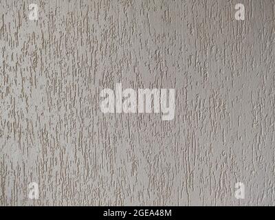 Decorative embossed concrete and glue plaster. Gray plastered wall. Background of gray old concrete wall. light and shadow pattern Stock Photo