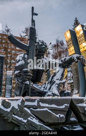 The strain of war is permanently etched upon this statue of a weary soldier in Ekateringburg in Russia. Stock Photo
