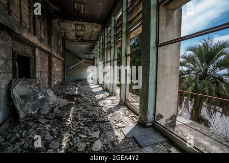 The interior of an abandoned Soviet-era factory in Sukhum in Abkhazia. Stock Photo