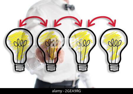Brainstorming concept shown by a man in background Stock Photo
