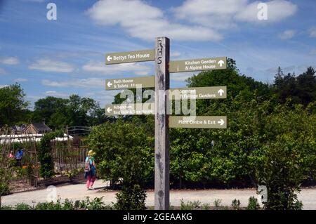 Wooden Signpost at RHS Garden Harlow Carr, Harrogate, Yorkshire, England, UK. Stock Photo
