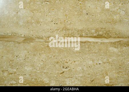 White or Beige colored patterned Marble stone texture mostly used in home interiors living area, Marble flooring backdrops Stock Photo