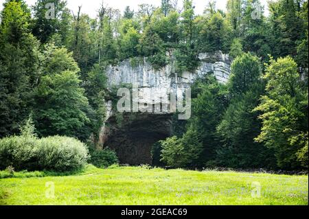 Natural stone arch bridge in the Rakov Škocjan Landscape Park Stock Photo