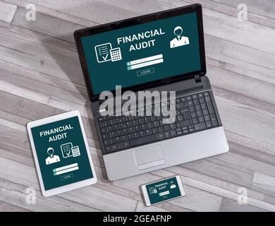 Financial audit concept shown on different information technology devices Stock Photo