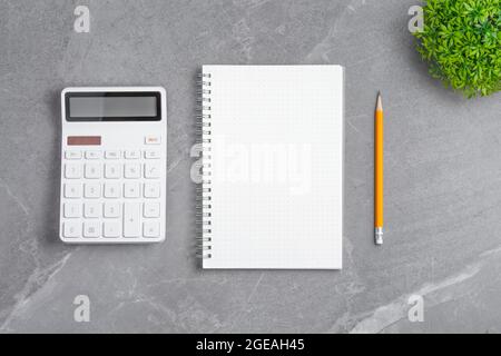 Copyspace of minimal workplace with office supplies on wooden table and white  wall background Stock Photo - Alamy