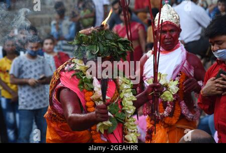 Guwahati, Guwahati, India. 18th Aug, 2021. Deodhani dancer perform Deodhani nritya (dance) during annual Manasha Puja (worship of Snakes ) at Kamakhya temple in Guwahati Assam India on Wednesday 18th August 2021 (Credit Image: © Dasarath Deka/ZUMA Press Wire) Stock Photo