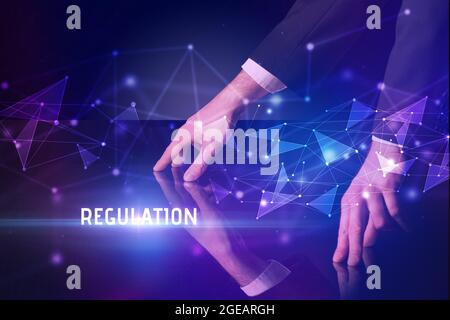 Businessman touching huge screen concept Stock Photo