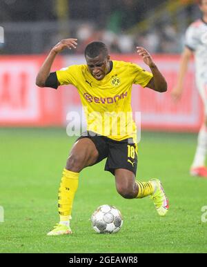 Dortmund, Deutschland. 18th Aug, 2021. Youssoufa MOUKOKO (DO) is angry, frustrated Soccer Supercup Final, Borussia Dortmund (DO) - FC Bayern Munich (M), on 08/17/2021 in Dortmund/Germany. #DFL regulations prohibit any use of photographs as image sequences and/or quasi-video # Â Credit: dpa/Alamy Live News Stock Photo