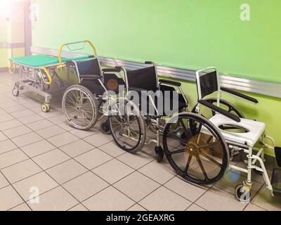 Wheelchairs in a hospital for the sick. The movement of non-walking people. Healthcare and medicine Stock Photo