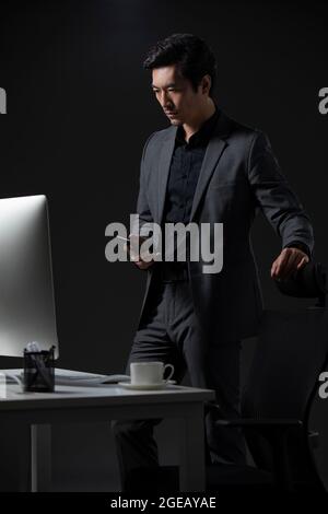 Successful Chinese businessman working Stock Photo