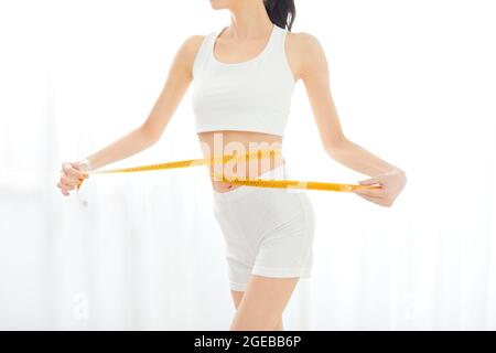 Healthy Japanese woman fit a home Stock Photo