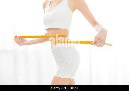 Healthy Japanese woman fit a home Stock Photo