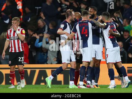West Bromwich, England, 18th August 2021.  West Bromwich Albion players celebrate an own goal from Jack Robinson of Sheffield Utd during the Sky Bet Championship match at The Hawthorns, West Bromwich. Picture credit should read: Simon Bellis / Sportimage Credit: Sportimage/Alamy Live News Credit: Sportimage/Alamy Live News Stock Photo