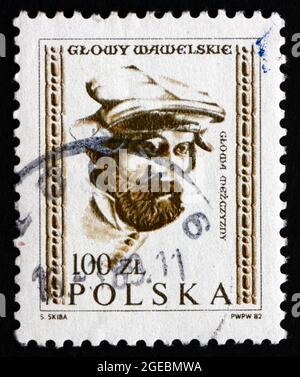 POLAND - CIRCA 1982: a stamp printed in the Poland shows Man’s Head, Wawel Castle, circa 1982 Stock Photo