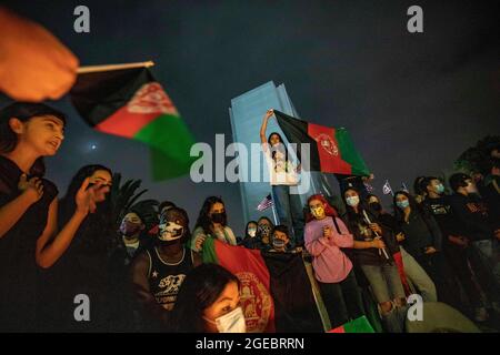 Los Angeles, California, USA. 17th Aug, 2021. Members of the Los Angeles Afghan community hold a candlelight vigil outside the federal building in Westwood in response to the Taliban taking control of Afghanistan. (Credit Image: © Jill Connelly/ZUMA Press Wire) Stock Photo