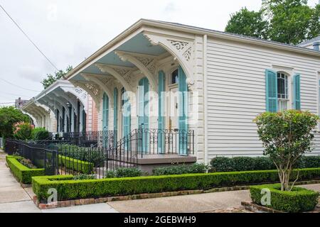NEW ORLEANS, LA, USA - JULY 20, 2021: Row of camelback houses in Garden District of New Orleans Stock Photo
