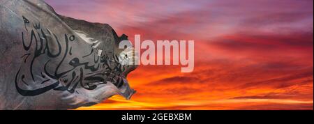 retro old white Taliban flag waving at cloudy sky background on sunset, panoramic view. copy space for wide banner. 3d illustration. Stock Photo