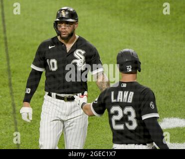 Chicago, United States. 18th Aug, 2021. Chicago White Sox Yoan Moncada (10) celebrates scoring with Jake Lamb (23) during the fourth inning against the Oakland Athletics at Guaranteed Rate Field in Chicago on Wednesday, August 18, 2021. Photo by Mark Black/UPI Credit: UPI/Alamy Live News Stock Photo