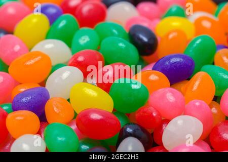 Pile of Colorful Jelly Bean Candy Background Texture. Stock Photo